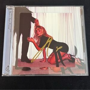 Signed Sabrina Carpenter Man’s Best Friend CD Gold Signature